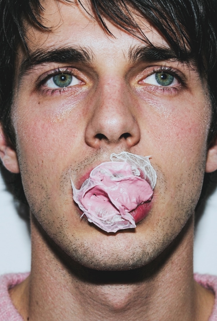 Close-up portrait with chewed gum